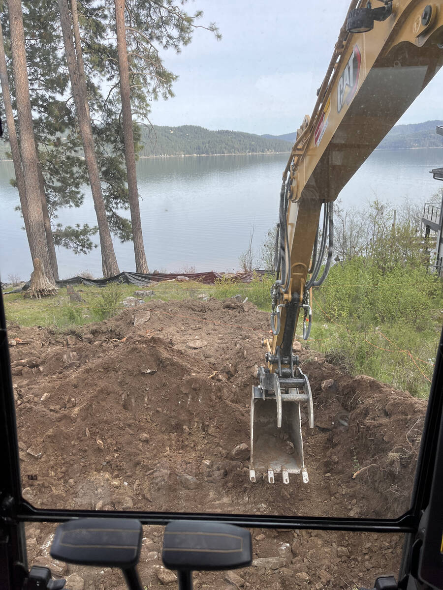 Elkry Construction plow truck working through deep snow in North Idaho winter