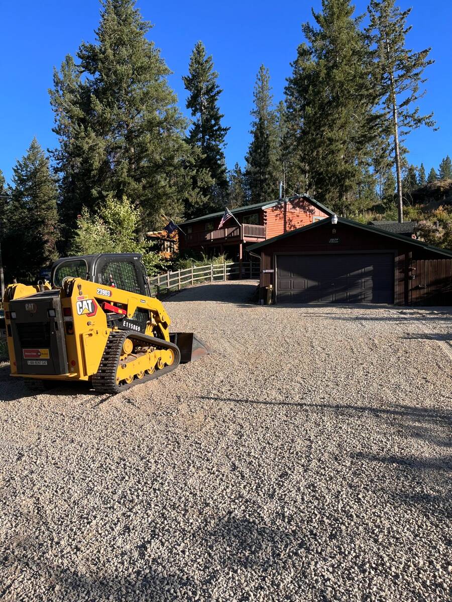 Large natural stone slab staircase installed at lakefront property in Coeur d'Alene Idaho by Elkry Construction
